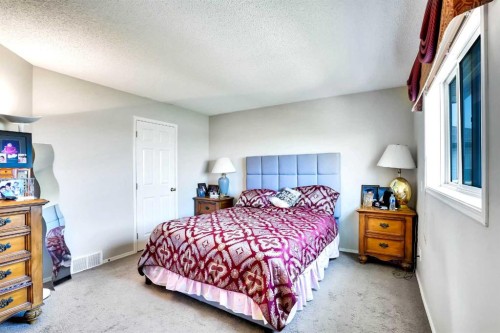 69 Coral Springs Park Ne, Calgary, AB - Indoor Photo Showing Bedroom