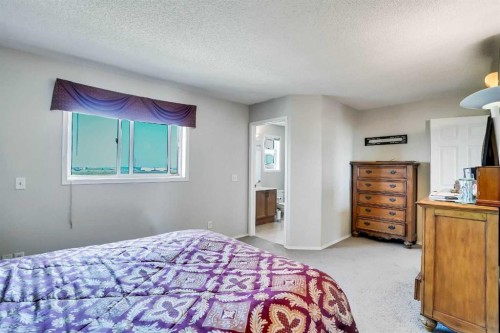 69 Coral Springs Park Ne, Calgary, AB - Indoor Photo Showing Bedroom
