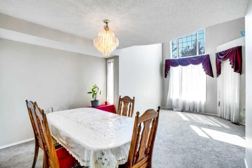 69 Coral Springs Park Ne, Calgary, AB - Indoor Photo Showing Dining Room