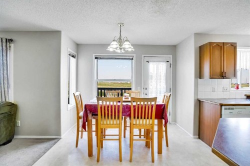 69 Coral Springs Park Ne, Calgary, AB - Indoor Photo Showing Dining Room