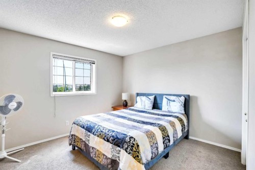 69 Coral Springs Park Ne, Calgary, AB - Indoor Photo Showing Bedroom