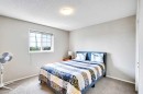 69 Coral Springs Park Ne, Calgary, AB  - Indoor Photo Showing Bedroom 