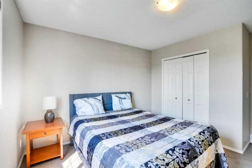 69 Coral Springs Park Ne, Calgary, AB - Indoor Photo Showing Bedroom