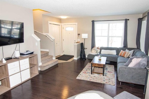 286 Promenade Way Se, Calgary, AB - Indoor Photo Showing Living Room