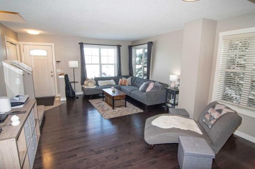 286 Promenade Way Se, Calgary, AB - Indoor Photo Showing Living Room