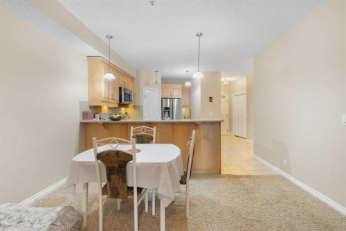 8103-14 Hemlock Crescent Sw, Calgary, AB - Indoor Photo Showing Dining Room