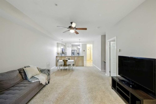8103-14 Hemlock Crescent Sw, Calgary, AB - Indoor Photo Showing Living Room