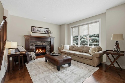95 Cranarch Circle Se, Calgary, AB - Indoor Photo Showing Living Room With Fireplace
