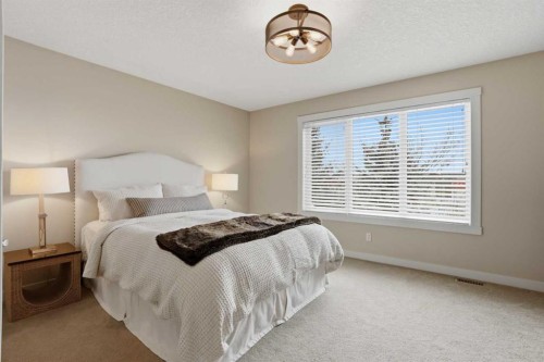 95 Cranarch Circle Se, Calgary, AB - Indoor Photo Showing Bedroom