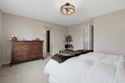 95 Cranarch Circle Se, Calgary, AB - Indoor Photo Showing Bedroom