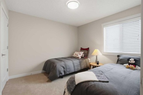 95 Cranarch Circle Se, Calgary, AB - Indoor Photo Showing Bedroom