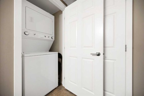 5105-755 Copperpond Boulevard Se, Calgary, AB - Indoor Photo Showing Laundry Room