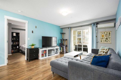5105-755 Copperpond Boulevard Se, Calgary, AB - Indoor Photo Showing Living Room