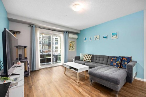 5105-755 Copperpond Boulevard Se, Calgary, AB - Indoor Photo Showing Living Room