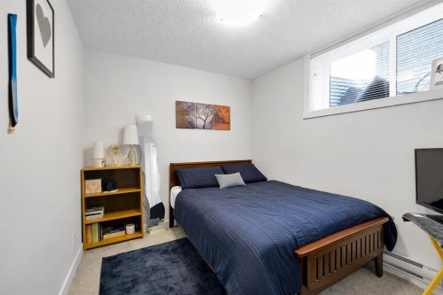 317 Cranbrook Square Se, Calgary, AB - Indoor Photo Showing Bedroom