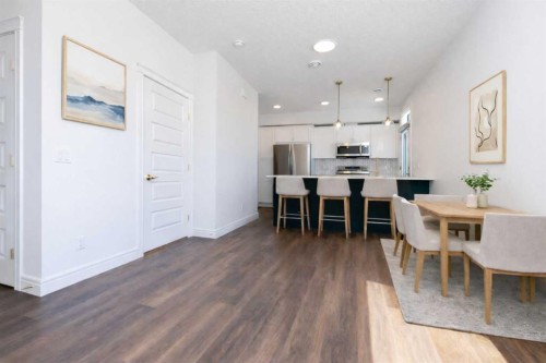 209-414 Seton Passage Se, Calgary, AB - Indoor Photo Showing Dining Room