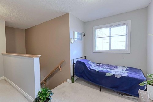 501 Coral Cove Ne, Calgary, AB - Indoor Photo Showing Bedroom