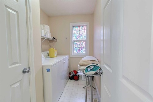 501 Coral Cove Ne, Calgary, AB - Indoor Photo Showing Laundry Room