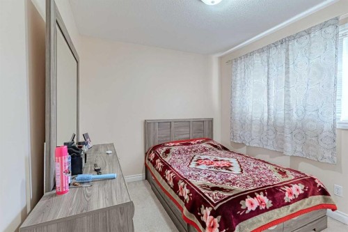 501 Coral Cove Ne, Calgary, AB - Indoor Photo Showing Bedroom