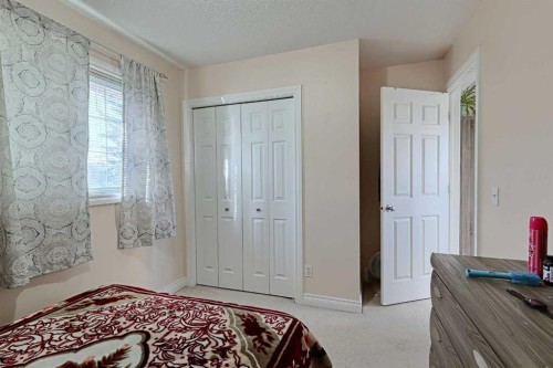 501 Coral Cove Ne, Calgary, AB - Indoor Photo Showing Bedroom