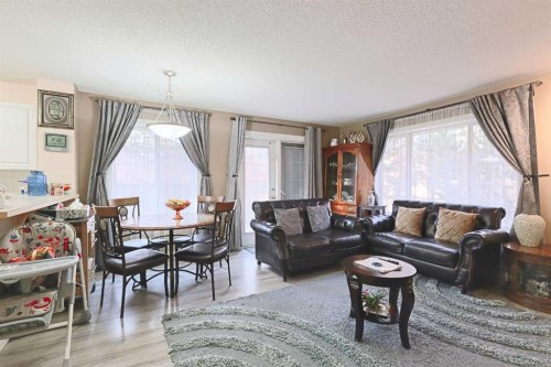 501 Coral Cove Ne, Calgary, AB - Indoor Photo Showing Living Room