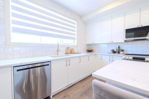 14 Tillotson Downs, Okotoks, AB - Indoor Photo Showing Kitchen With Upgraded Kitchen
