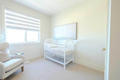14 Tillotson Downs, Okotoks, AB - Indoor Photo Showing Bedroom