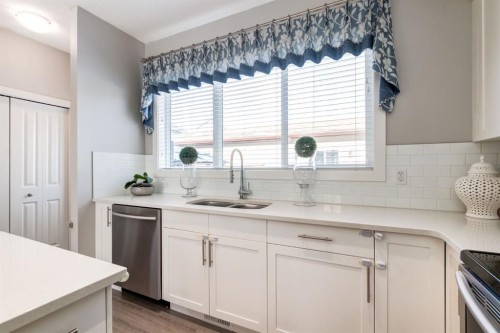1217 Legacy Circle Se, Calgary, AB - Indoor Photo Showing Kitchen With Double Sink
