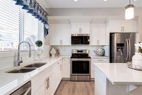 1217 Legacy Circle Se, Calgary, AB - Indoor Photo Showing Kitchen With Stainless Steel Kitchen With Double Sink With Upgraded Kitchen
