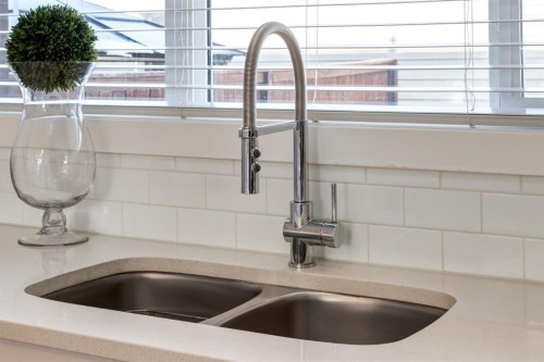 1217 Legacy Circle Se, Calgary, AB - Indoor Photo Showing Kitchen With Double Sink