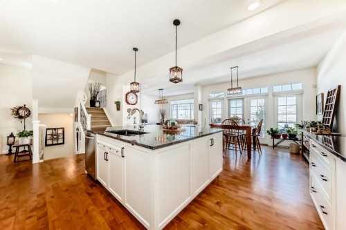 44 Riviera Way, Cochrane, AB - Indoor Photo Showing Kitchen With Upgraded Kitchen