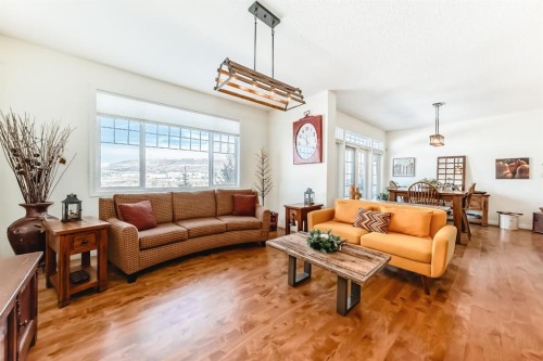 44 Riviera Way, Cochrane, AB - Indoor Photo Showing Living Room