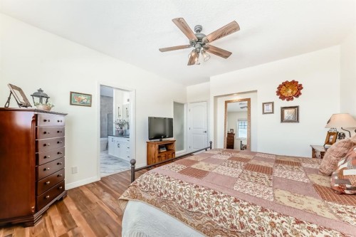 44 Riviera Way, Cochrane, AB - Indoor Photo Showing Bedroom