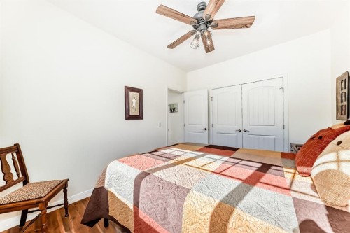 44 Riviera Way, Cochrane, AB - Indoor Photo Showing Bedroom