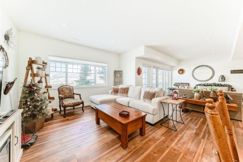 44 Riviera Way, Cochrane, AB - Indoor Photo Showing Living Room