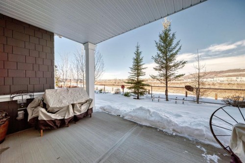 44 Riviera Way, Cochrane, AB - Outdoor With Exterior