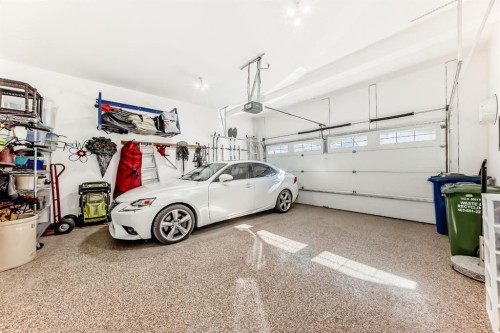 44 Riviera Way, Cochrane, AB - Indoor Photo Showing Garage