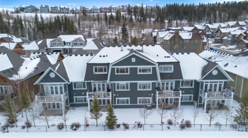 44 Riviera Way, Cochrane, AB - Outdoor With Facade