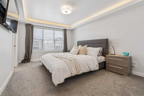 55 Sundown Crescent, Cochrane, AB - Indoor Photo Showing Bedroom