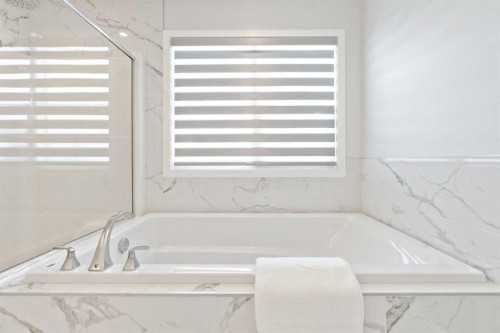 55 Sundown Crescent, Cochrane, AB - Indoor Photo Showing Other Room