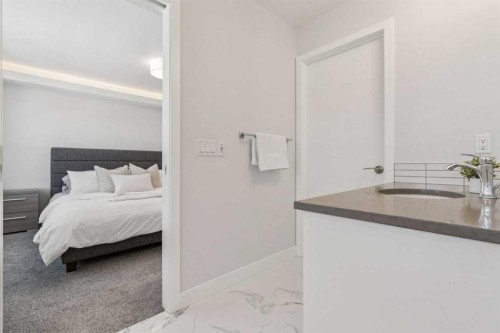 55 Sundown Crescent, Cochrane, AB - Indoor Photo Showing Bedroom