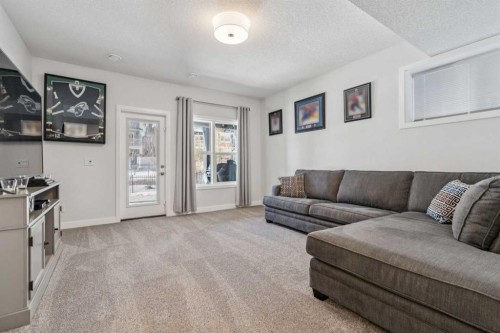 55 Sundown Crescent, Cochrane, AB - Indoor Photo Showing Living Room