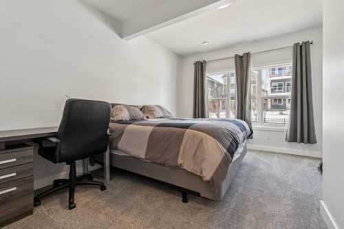 55 Sundown Crescent, Cochrane, AB - Indoor Photo Showing Bedroom