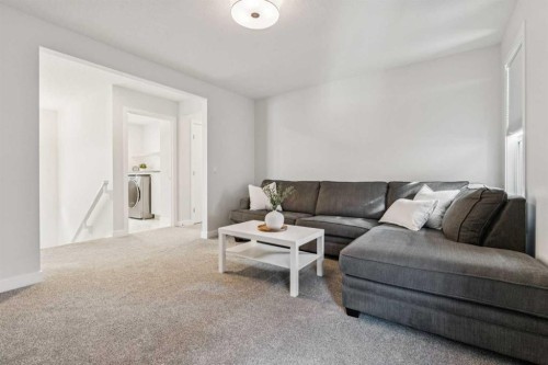 55 Sundown Crescent, Cochrane, AB - Indoor Photo Showing Living Room