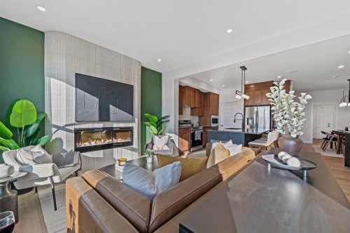 61 Keystone Creek Terrace, Calgary, AB - Indoor Photo Showing Living Room With Fireplace