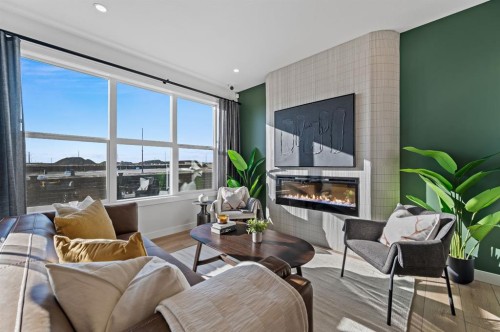 61 Keystone Creek Terrace, Calgary, AB - Indoor Photo Showing Living Room With Fireplace