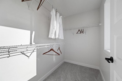 61 Keystone Creek Terrace, Calgary, AB - Indoor Photo Showing Other Room