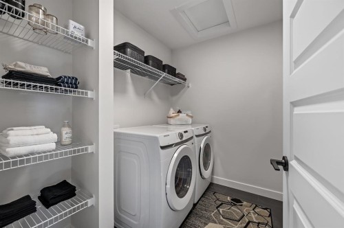 61 Keystone Creek Terrace, Calgary, AB - Indoor Photo Showing Laundry Room