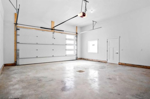 3442 Victory Way, Olds, AB - Indoor Photo Showing Garage
