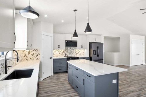3442 Victory Way, Olds, AB - Indoor Photo Showing Kitchen With Upgraded Kitchen